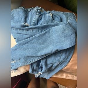 Denim jeans. Fringed bottom